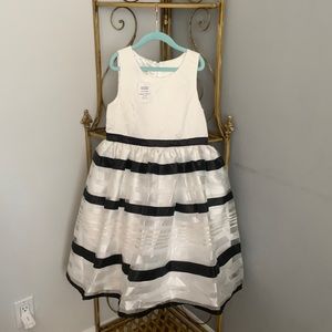 Never been worn before and in wonderful condition and so cute